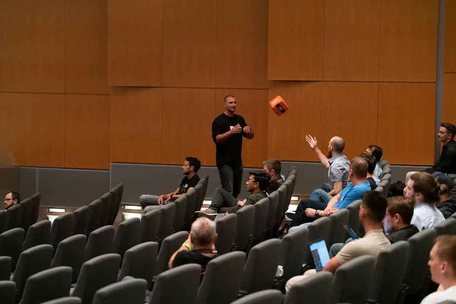 Catch box microphone being thrown mid air in a Q&A session